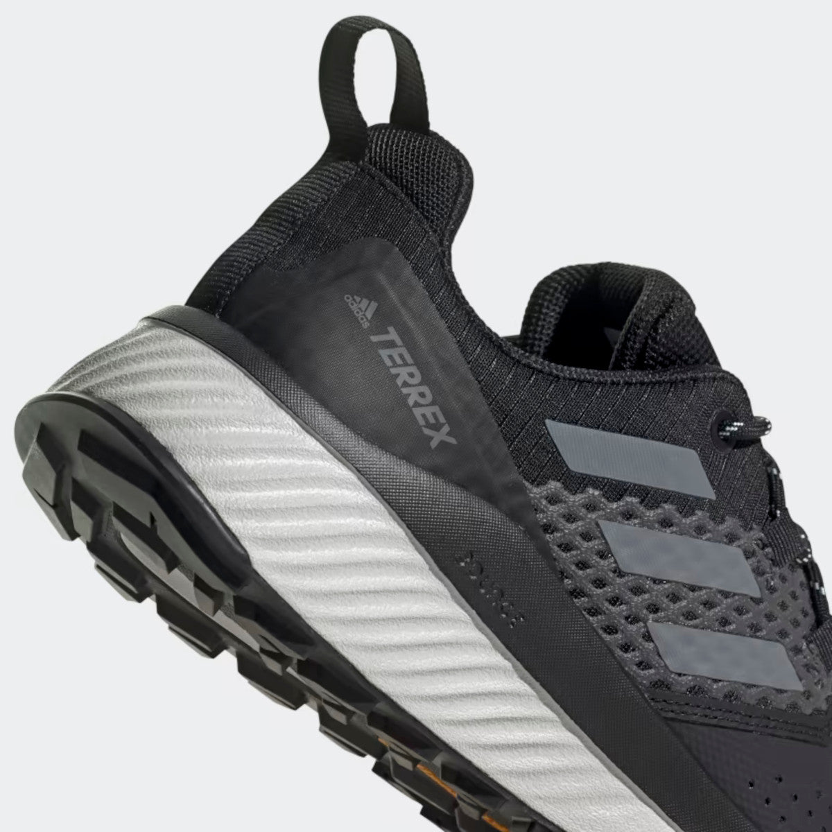 Heel image of the Adidas Women's Terrex Folgian Hiker - Black/Grey