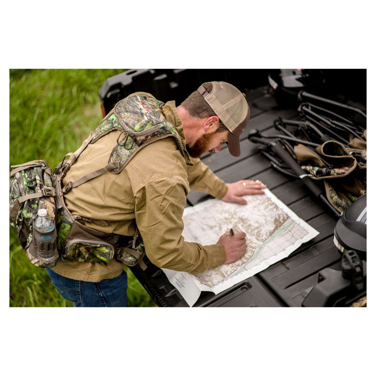 ALPS OutdoorZ Long Spur Mossy Oak Obsession Turkey Vest In-the-Field Image