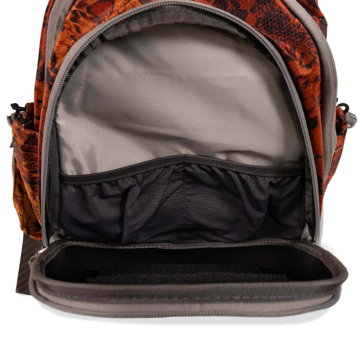 Inside image of the Fishtacker Riverpath Sling Pack in Firestorm.
