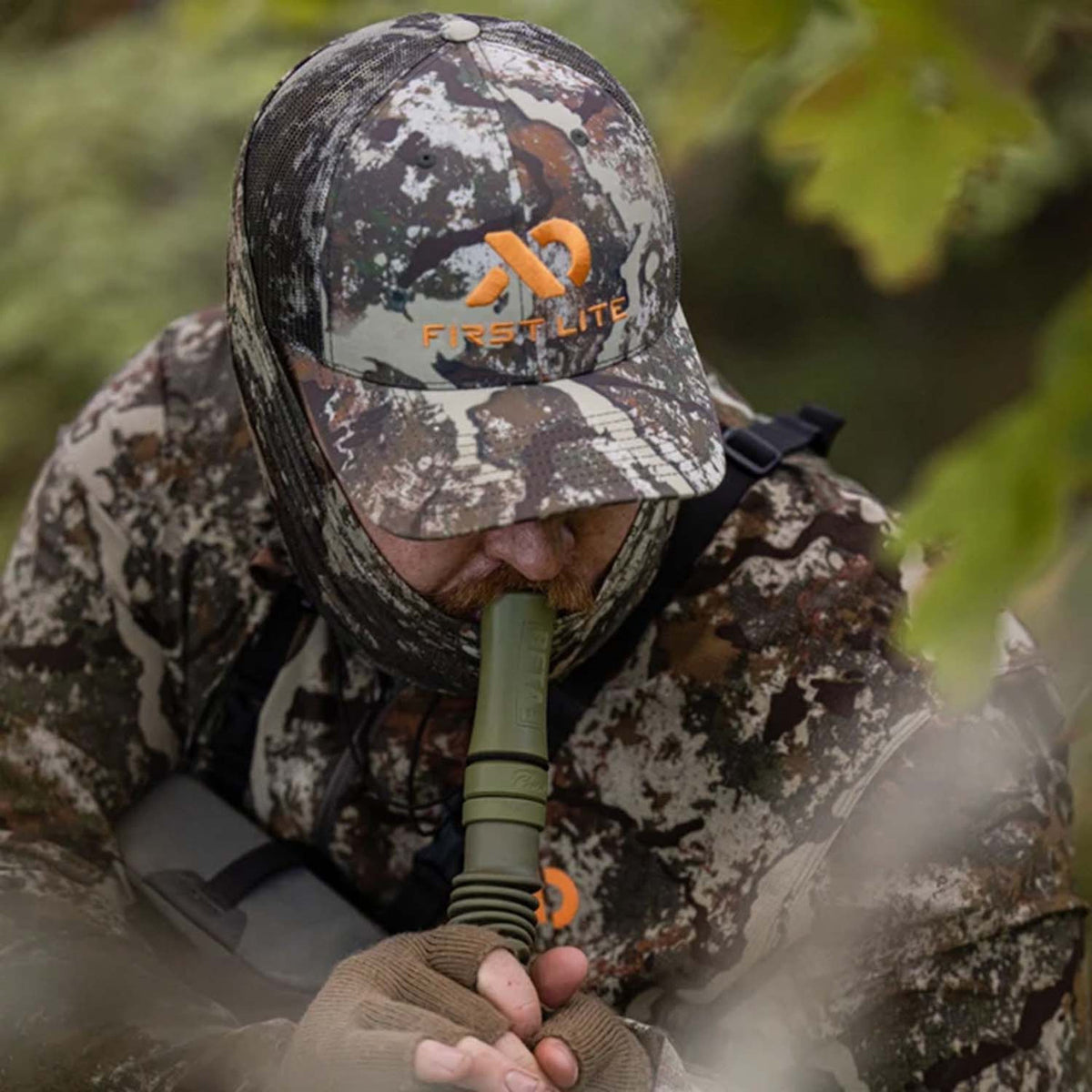 Lifestyle Image of the First Lite Trucker Hat.