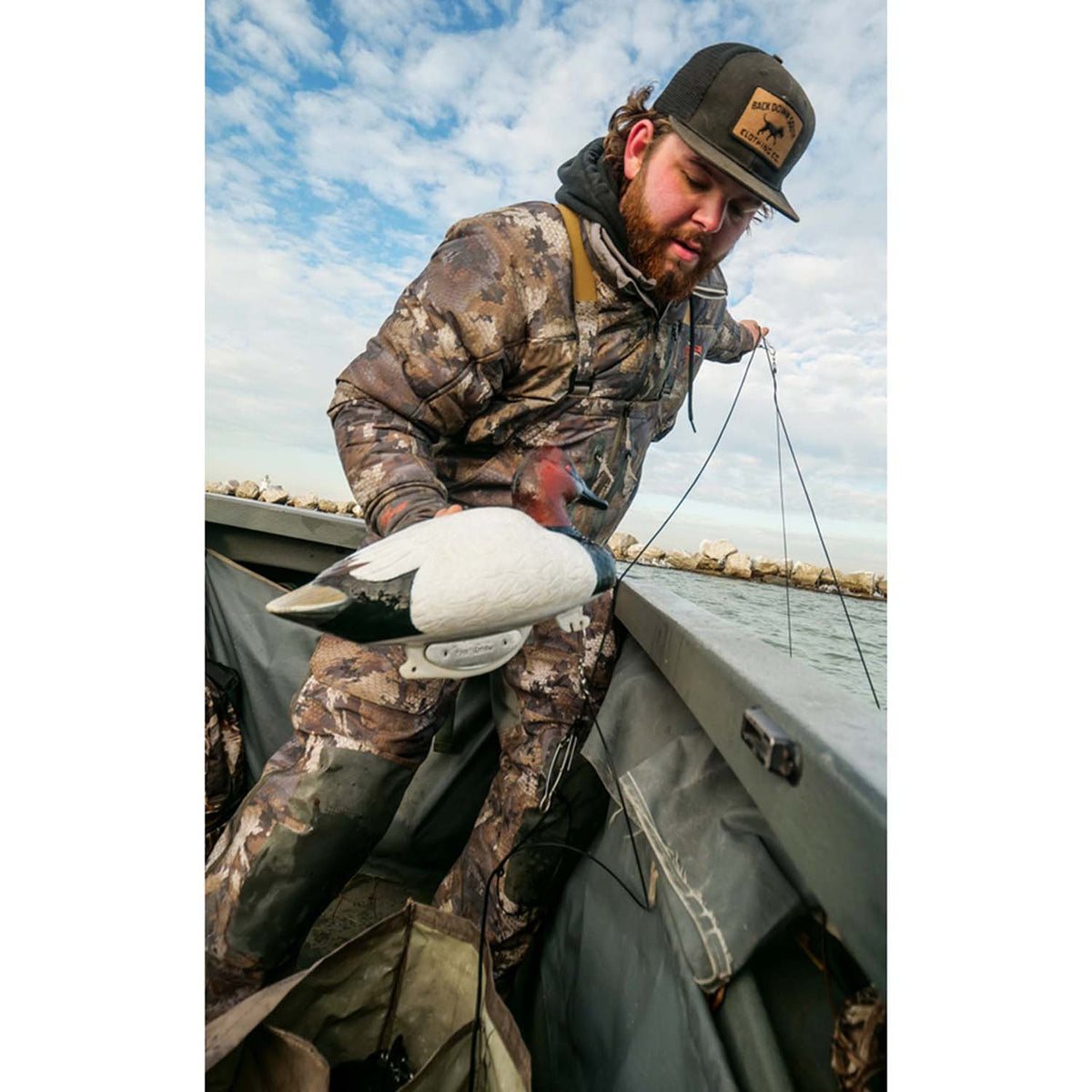 Lifestyle Image of the Flambeau Gunning Series Foam Filled Canvasback Floating Decoy.