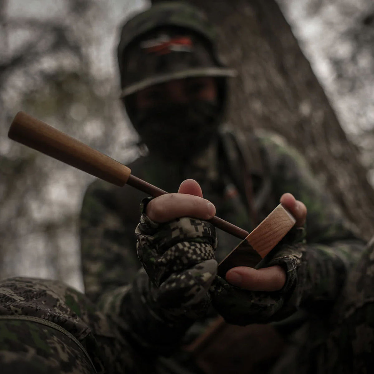 Mood Image of the Power Calls Heritage Series Slate/Walnut Pot Call.