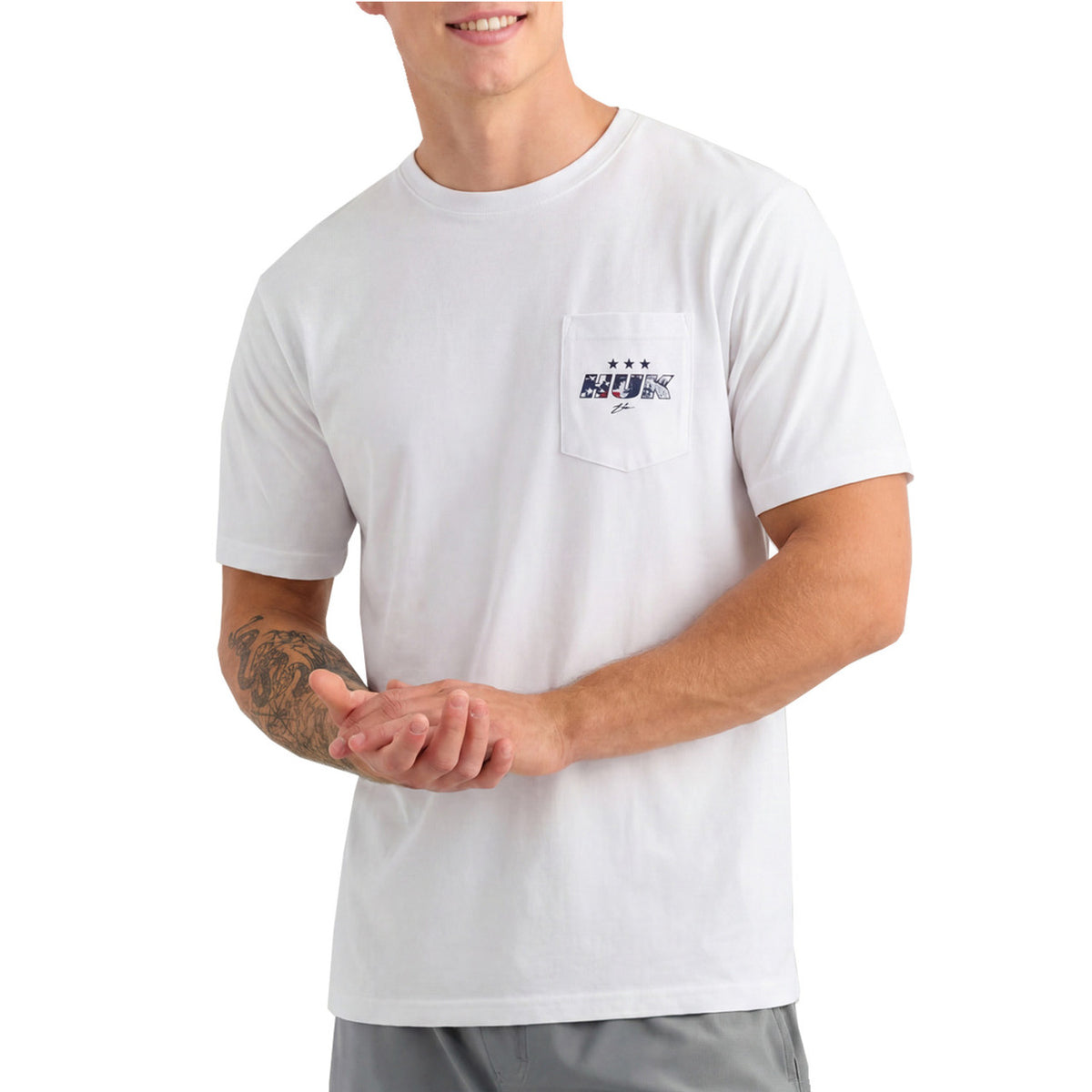Front Image of the Huk Performance Fishing America 250 Fish & Flag Tee.