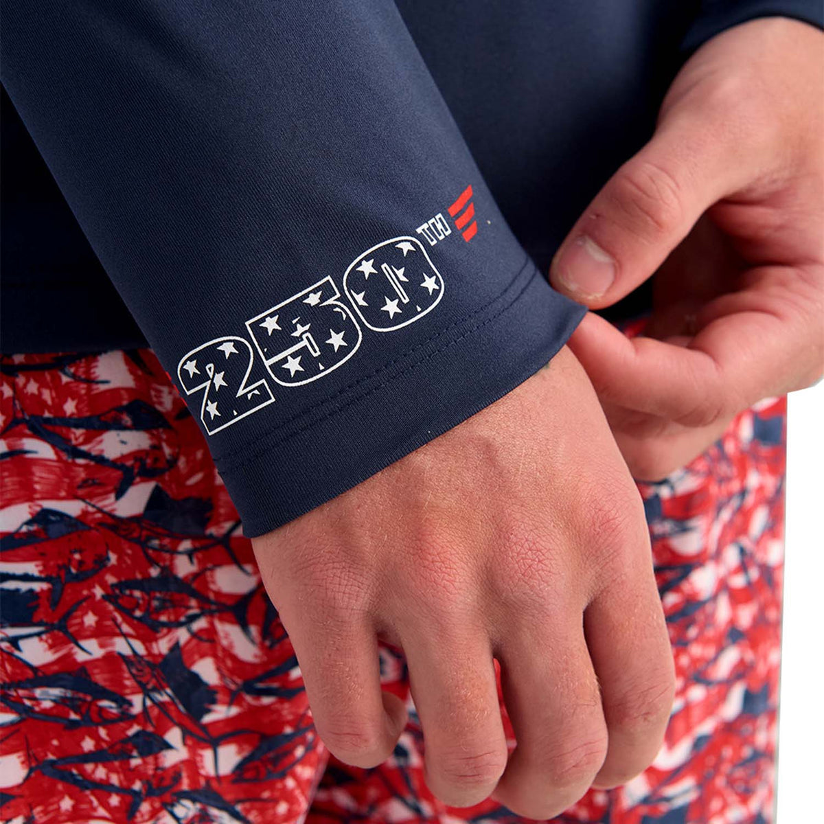 Cuff Image of the Huk Performance Fishing Pursuit America 250 Performance Hoodie.