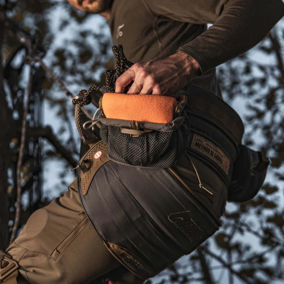 Latitude Operator Saddle Pouch Model In Tree Image