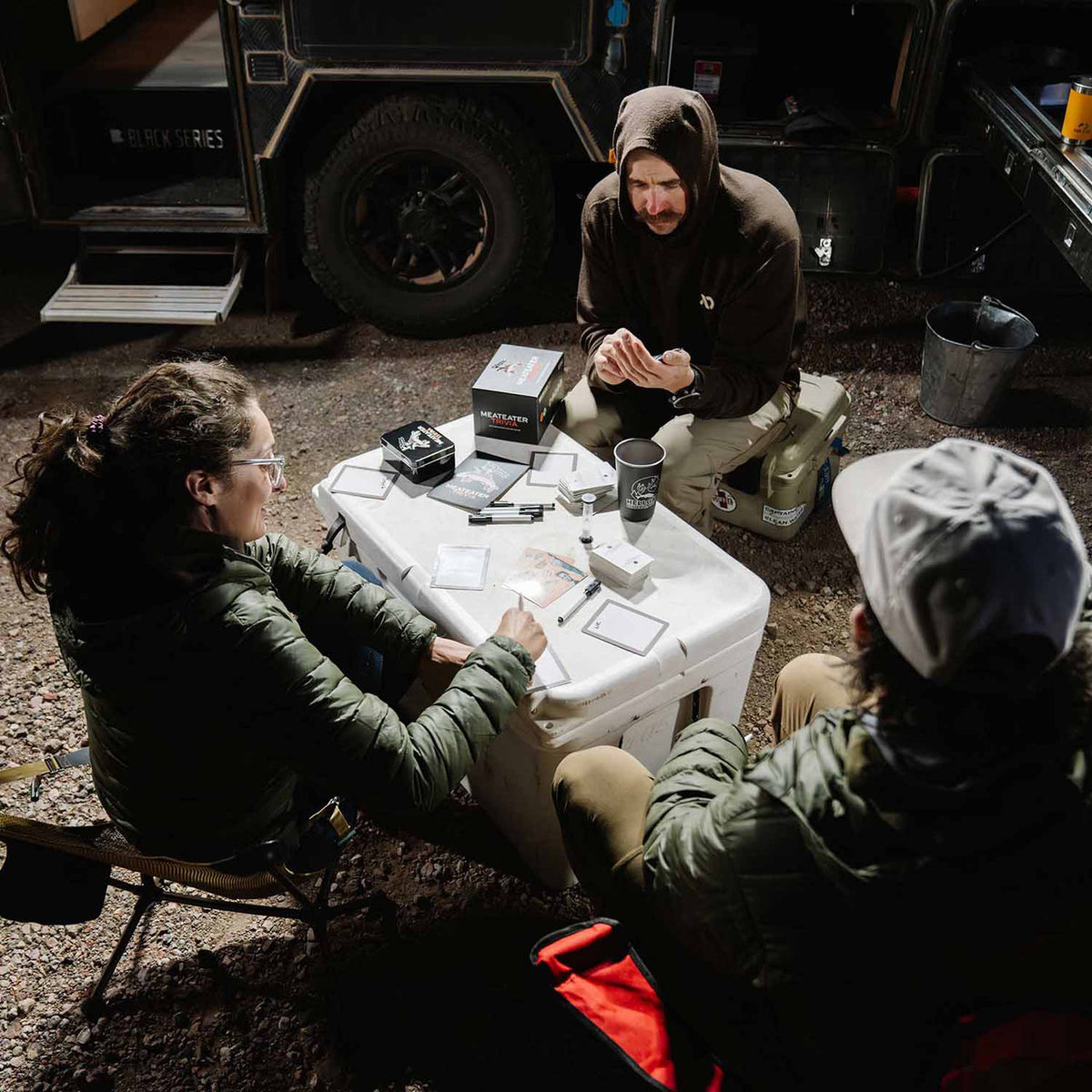 In use image of the MeatEater Trivia Board Game.