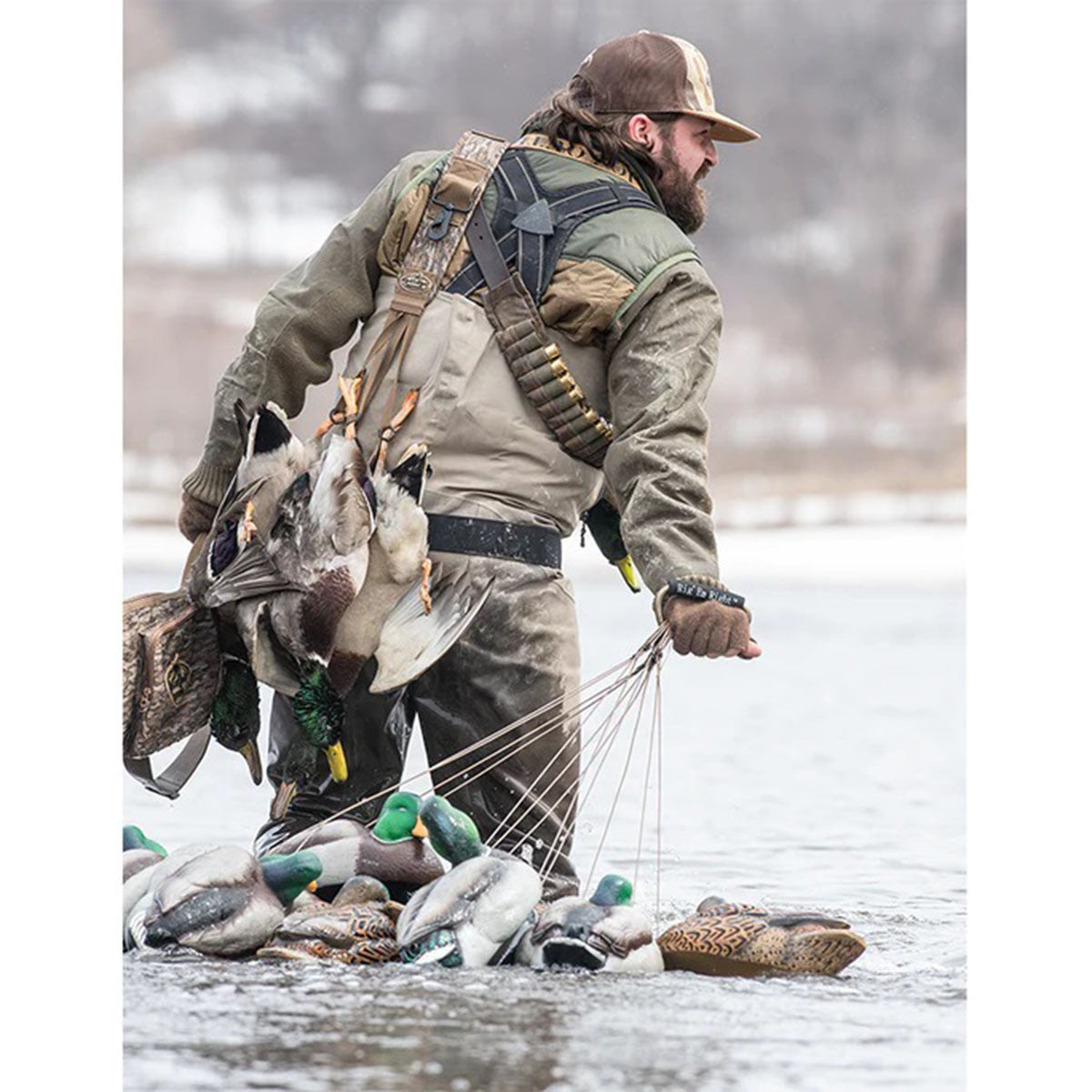 Rig'Em Right Leg Band Game Strap - Mossy Oak Bottomland In-the-Field Image