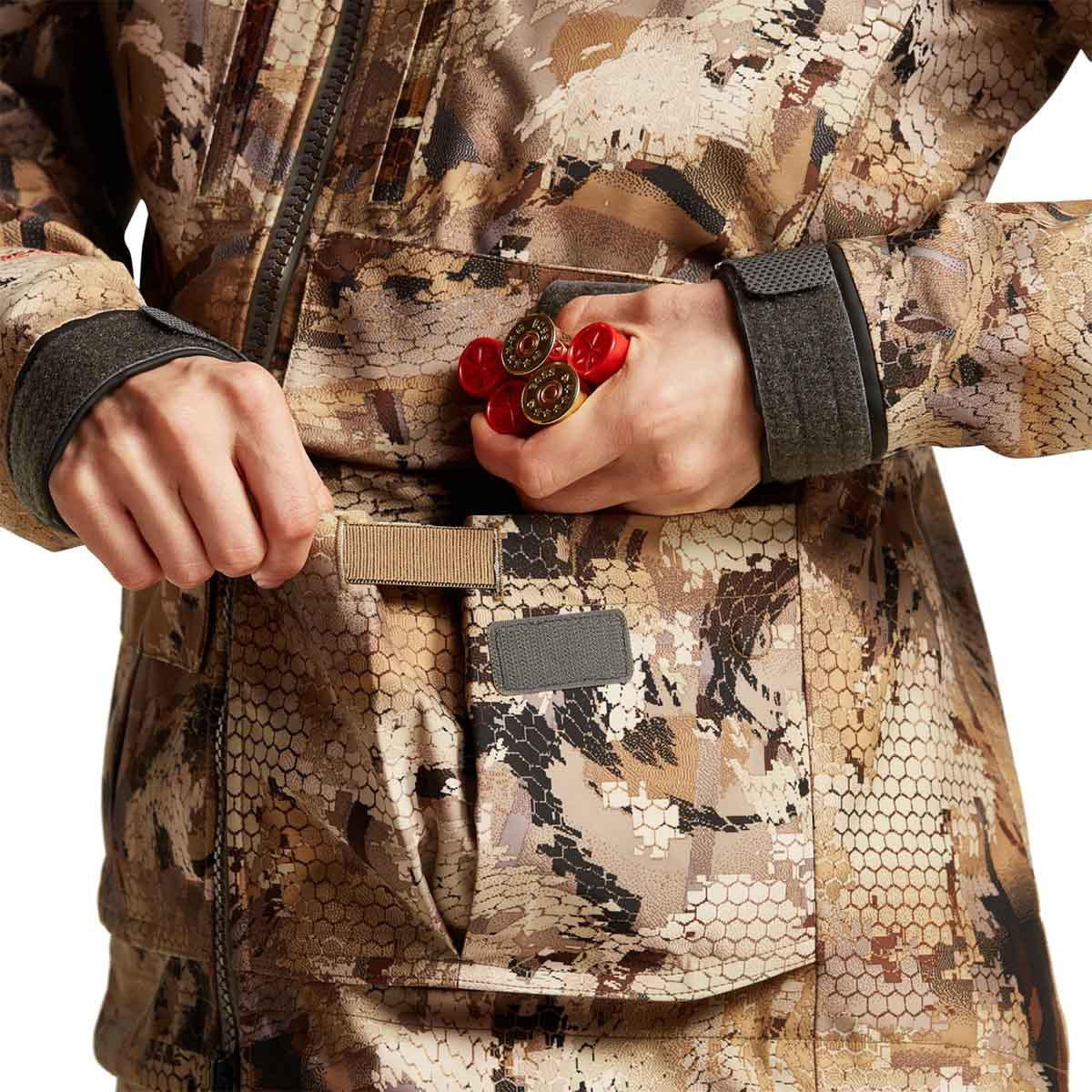Sitka Women's Hudson Jacket Shell Pocket Image in Optifade Waterfowl Marsh