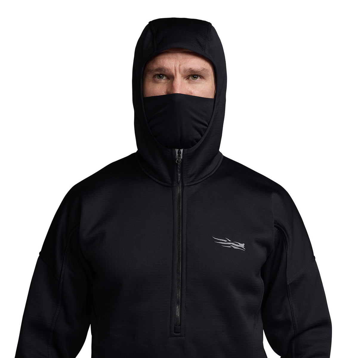 Model Image with Hood and Face Mask Up on the Sitka Solace Hoodie.