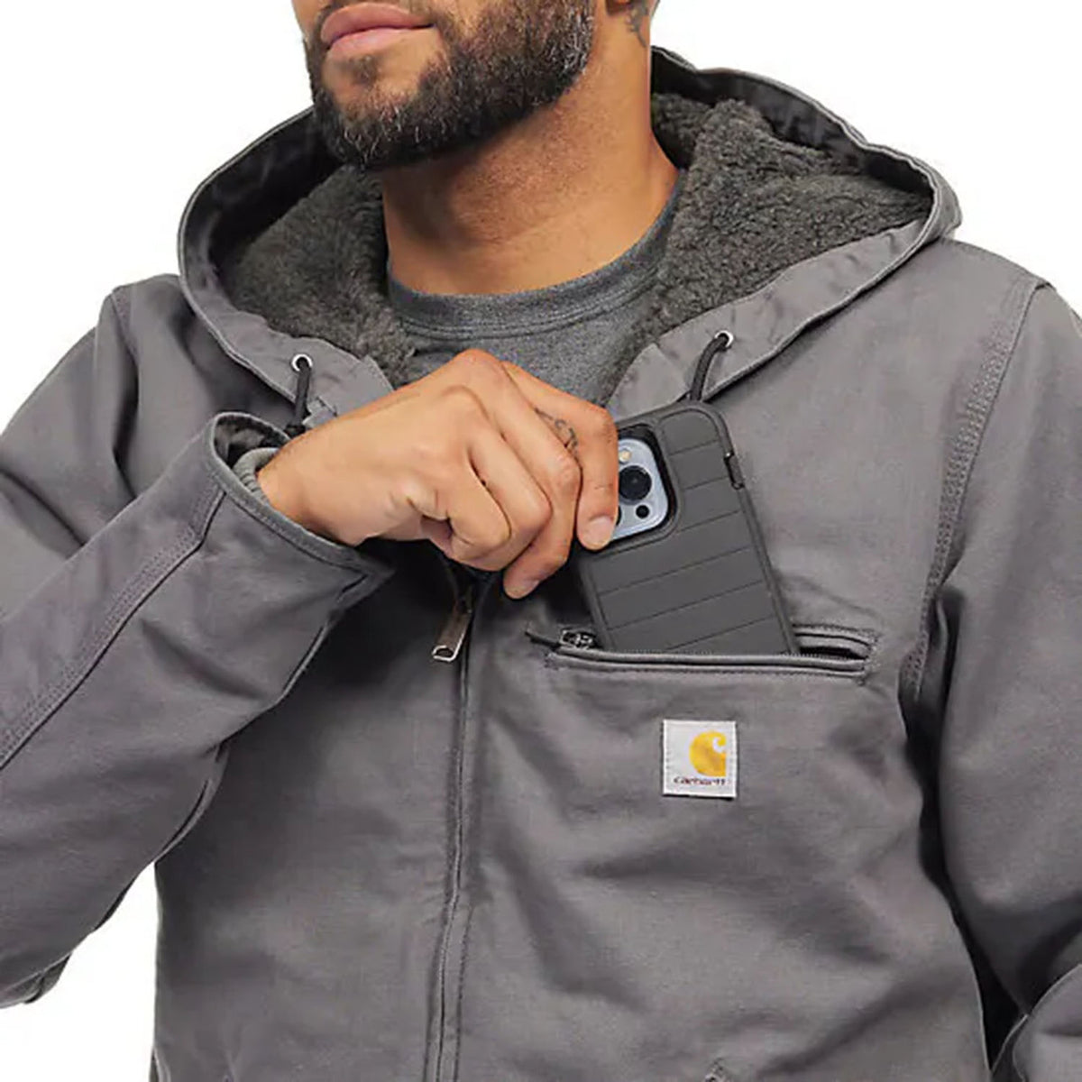 Carhartt Relaxed Fit Washed Duck Sherpa-Lined Jacket Pocket Image in Gravel Carhartt Brown
