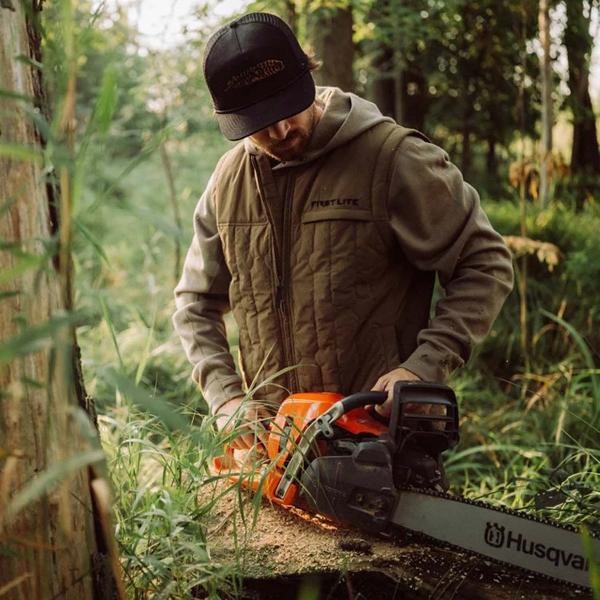 Lifestyle Image of the First Lite Outpost Vest.