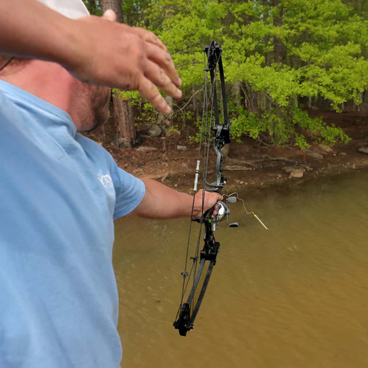 Lifestyle Image of the Muzzy V2 Bowfishing Left Handed Spin Kit.