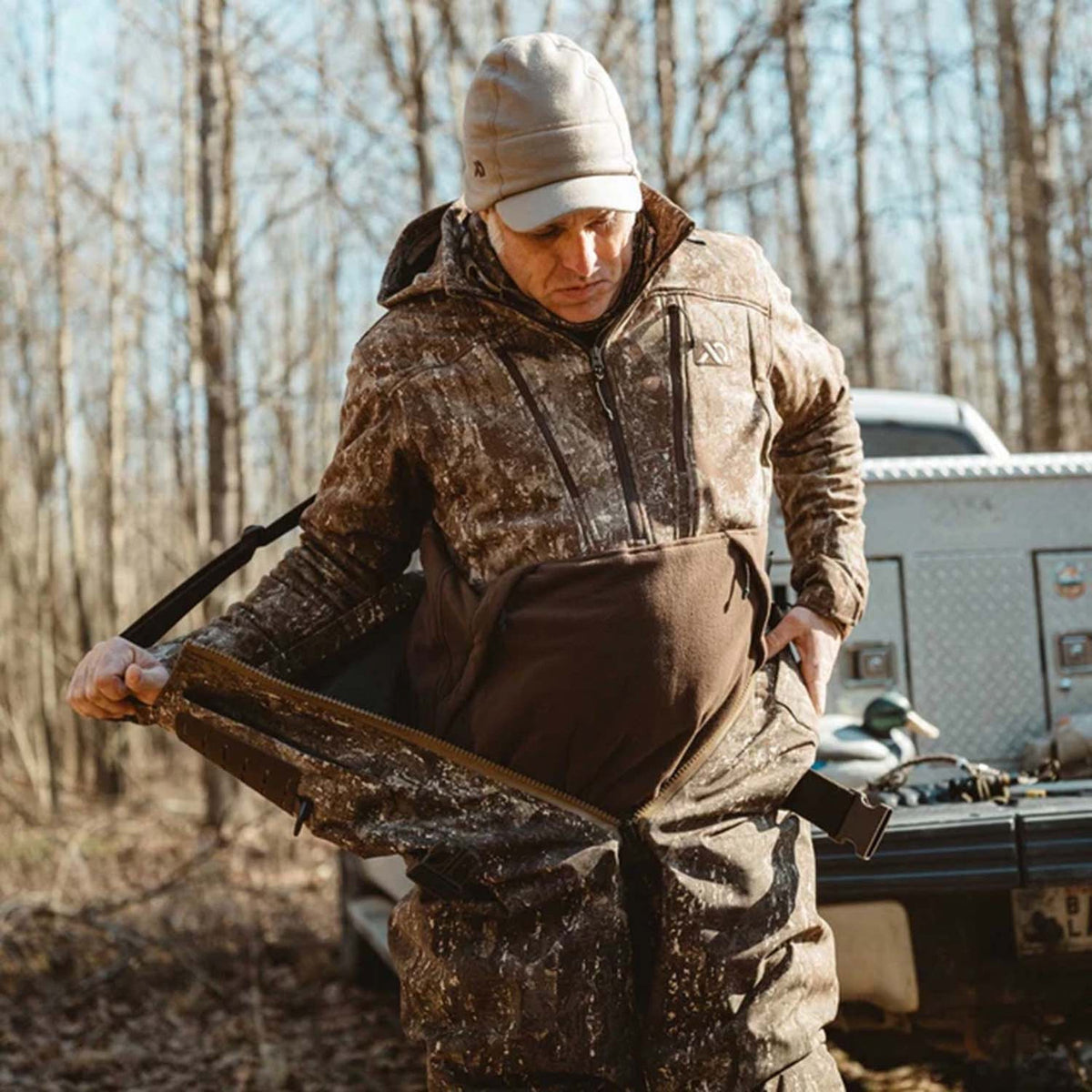 Lifestyle Image of the First Lite Suppressor Hybrid Jacket.