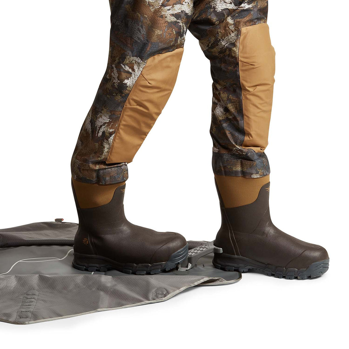 Stepping into the Bag Image of the Sitka Wader Storage Bag.
