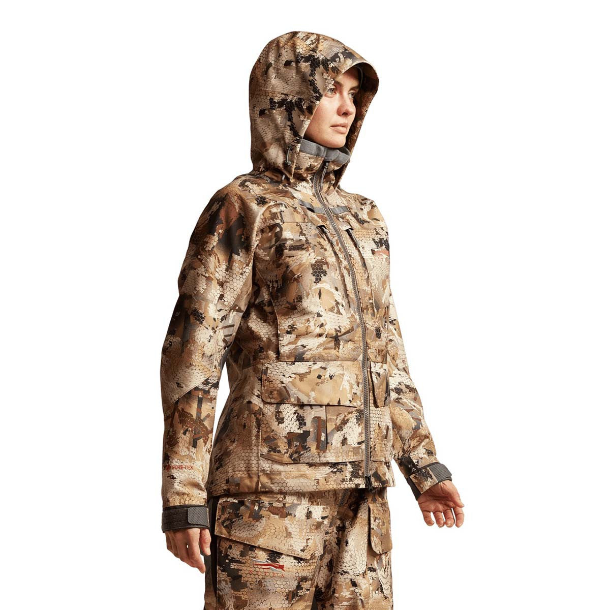 Sitka Women's Hudson Jacket Front Angled Model Image in Optifade Waterfowl Marsh