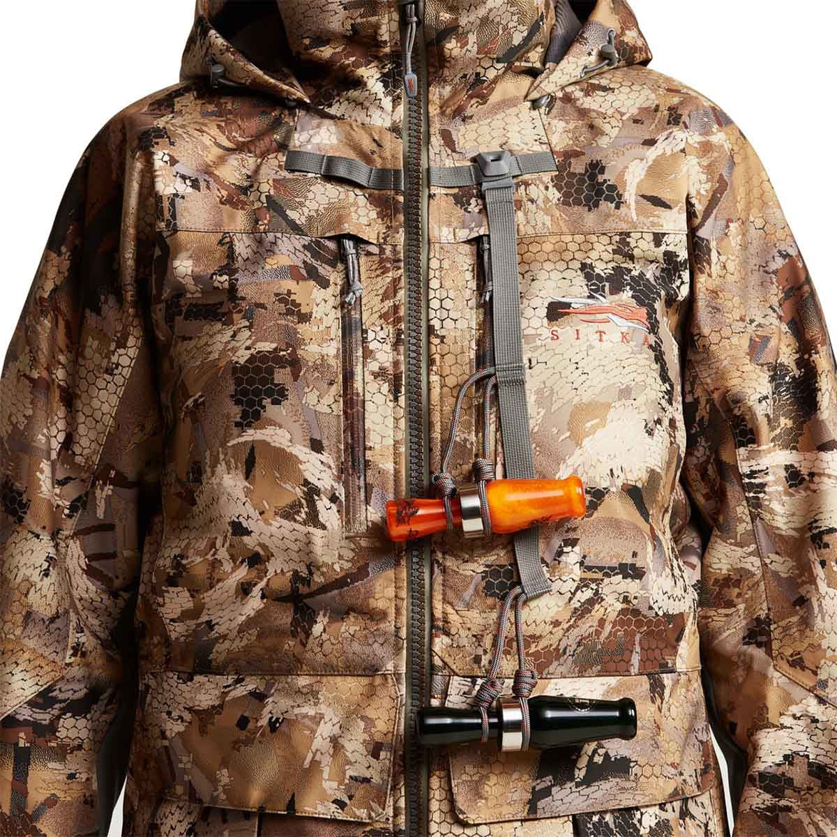 Sitka Women's Hudson Jacket Call Holder Image in Optifade Waterfowl Marsh