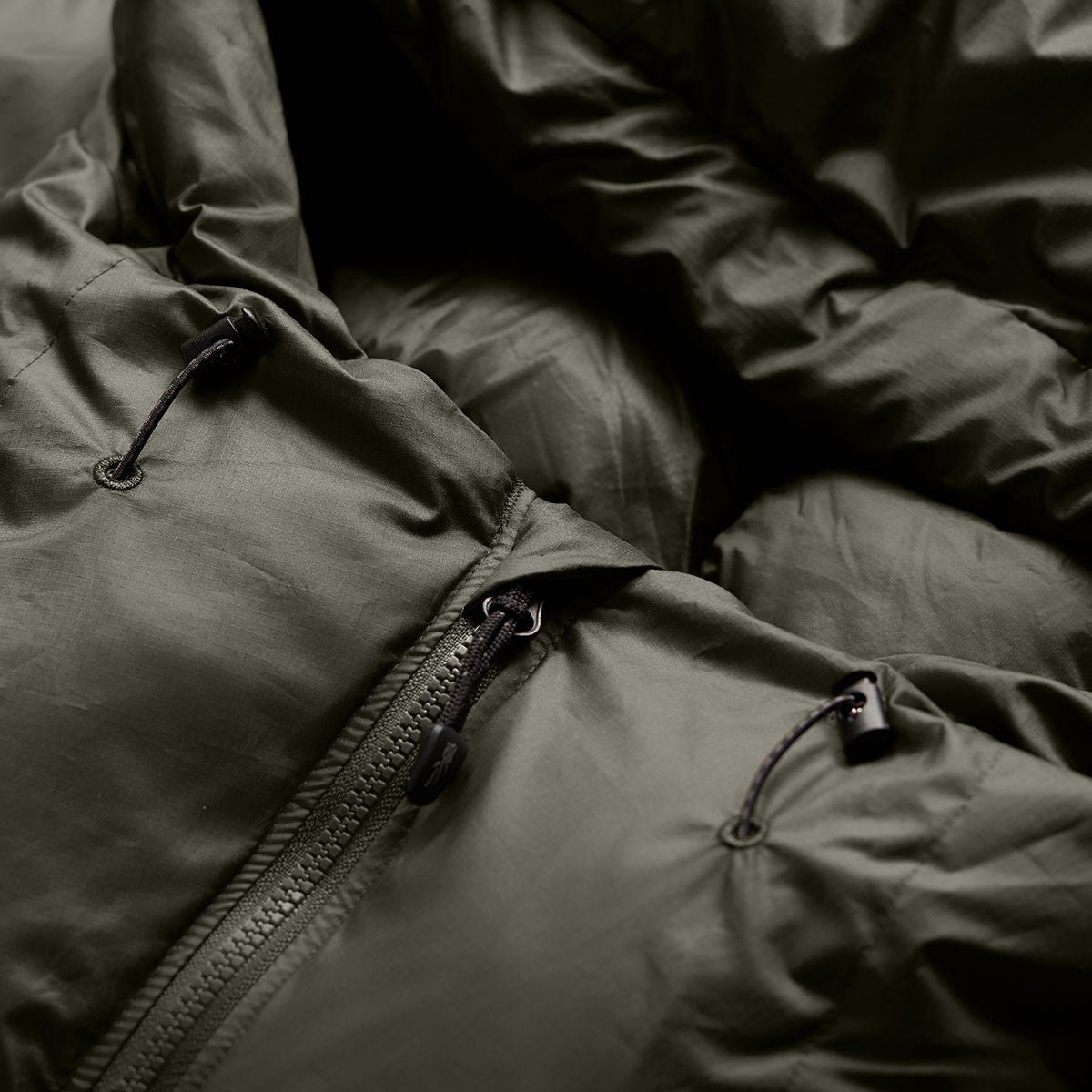 Sitka Kelvin HyperDown Jacket Detailed Zipper Image in Deep Lichen