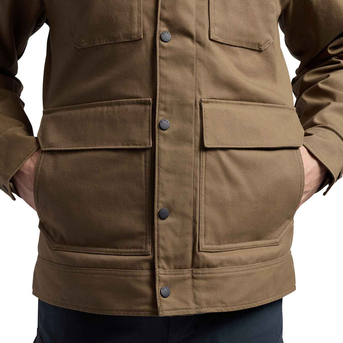 Hidden Pockets Image of the Sitka Grindstone Chore Coat.