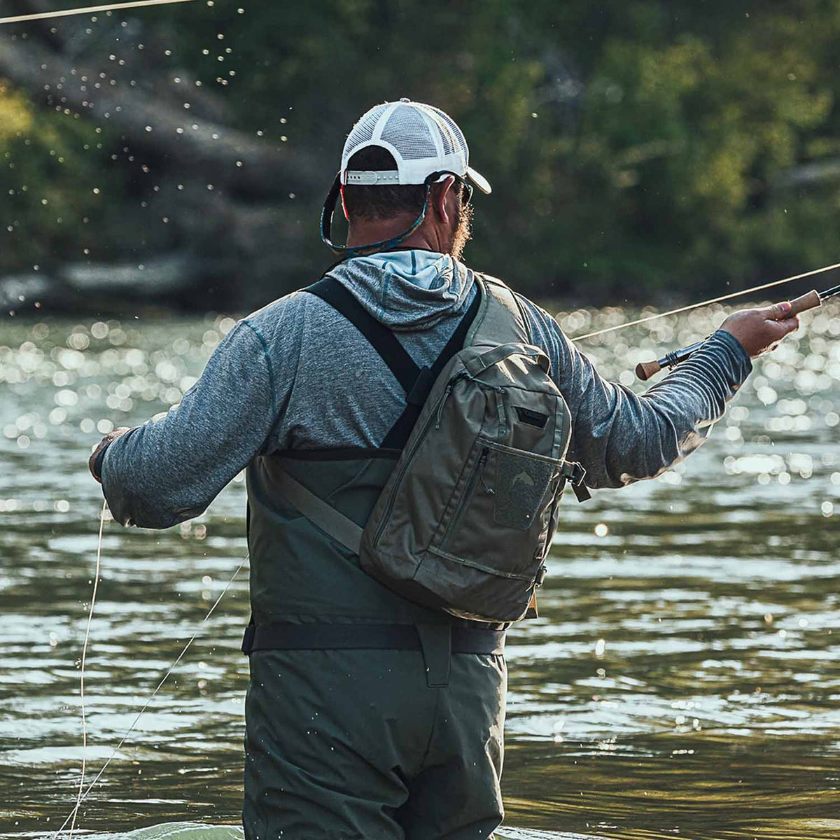 Simms Tributary Fishing Sling Pack Lifestyle Image