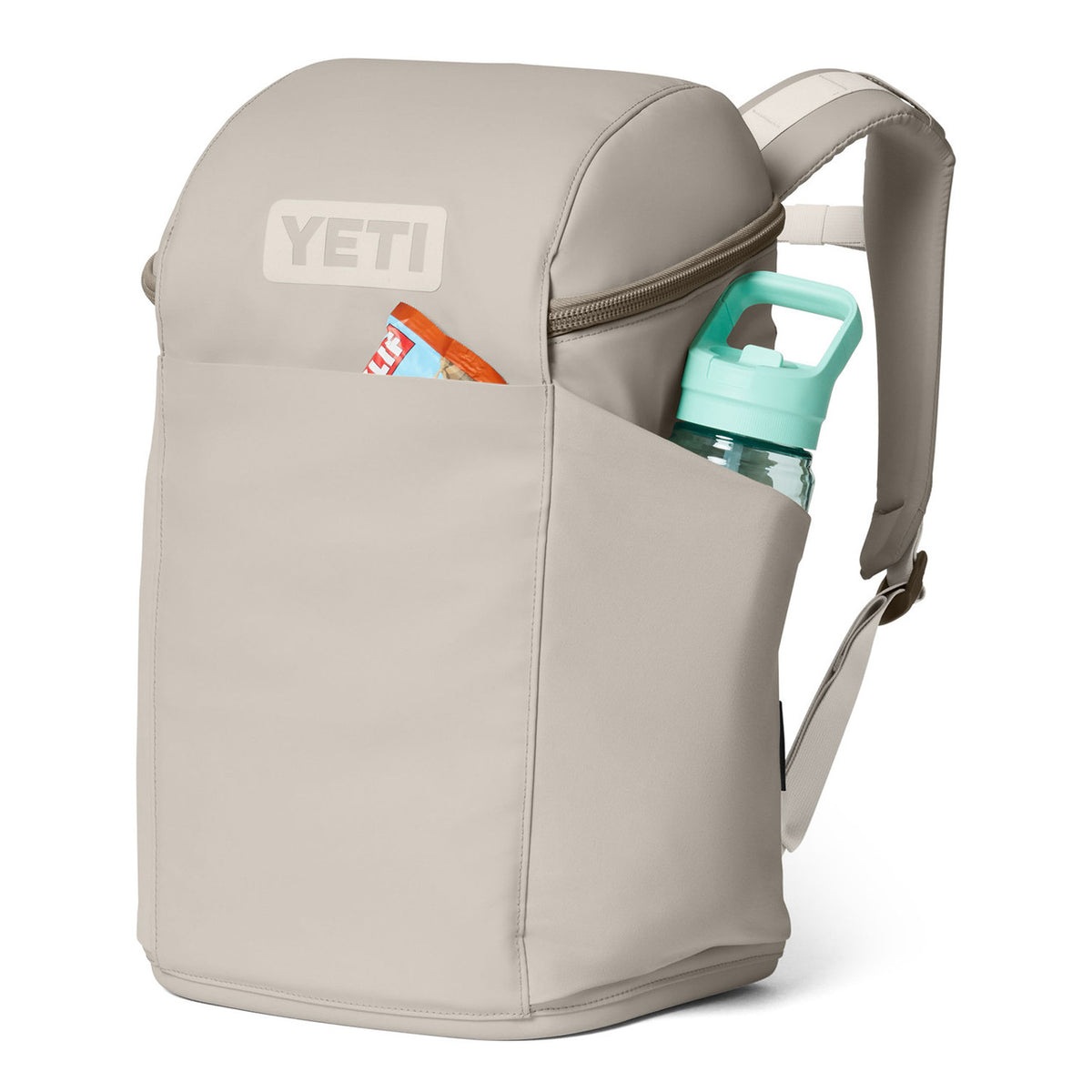 Front Angled Image with Contents of the Yeti Daytrip 20L Backpack.