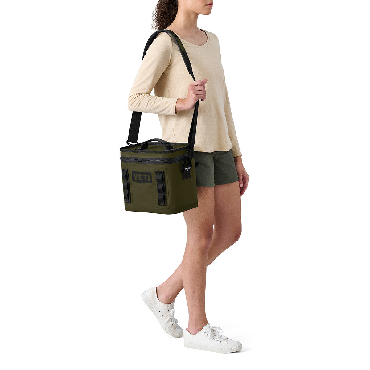 Model Image Carrying the Yeti Hopper Flip 8 Soft Cooler.