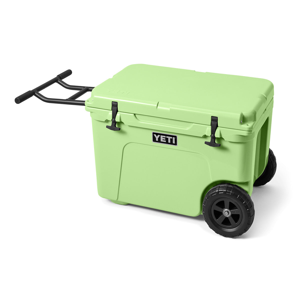 Yeti Tundra Haul Wheeled Cooler Side Image with Handle Out in Key Lime